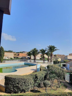 Studio cabine pour 4 personnes avec piscine commune